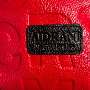 AIDRANI Red  bag /purse letter embossed design